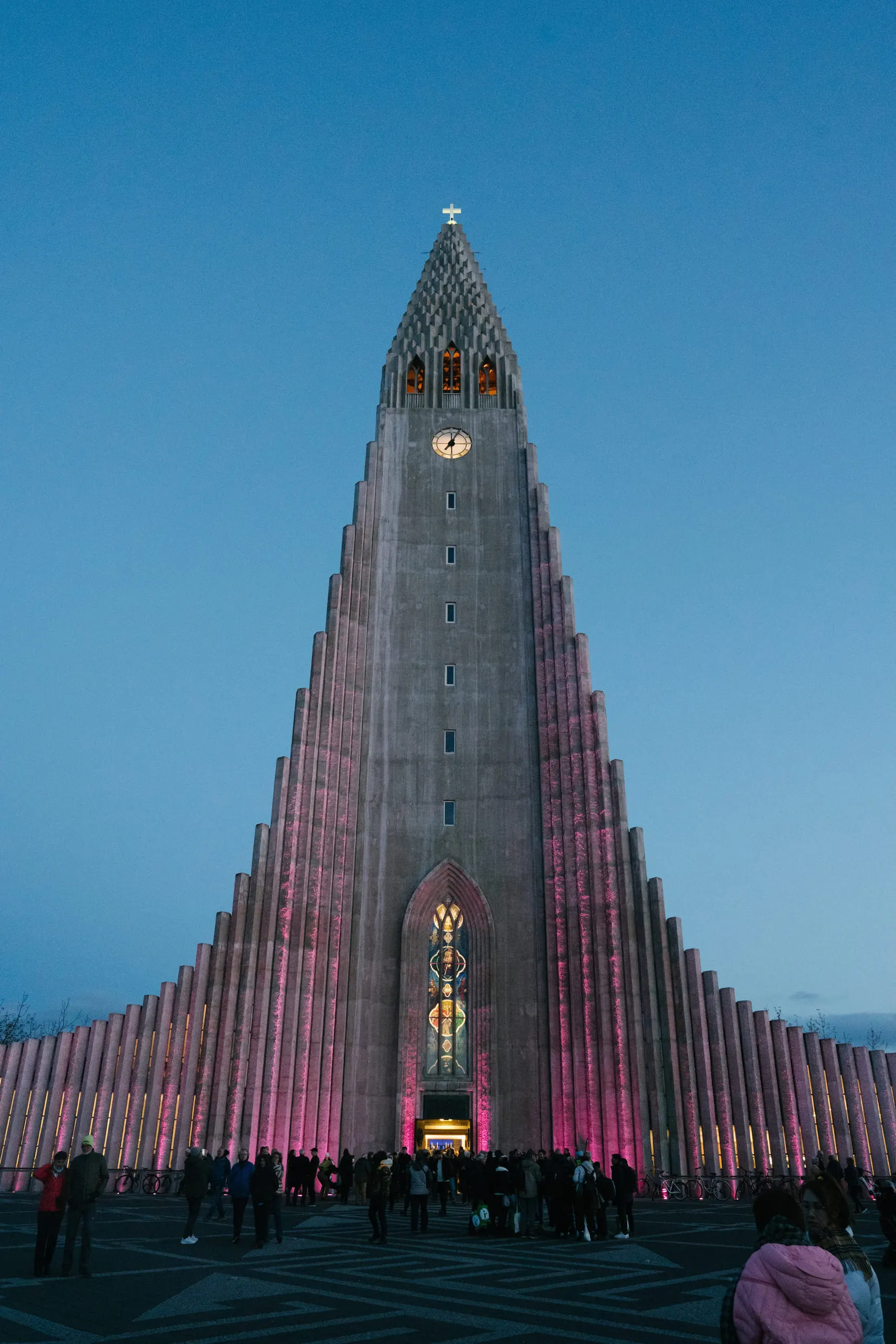 Hallgrímskirkja seen from below, its stepped concrete facade rising to the tower.